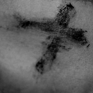 Photo of ashes in the sign of a cross